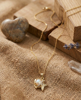 Fish white lobe gold plated necklace