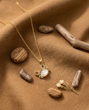 Capricorn white lobe gold plated necklace