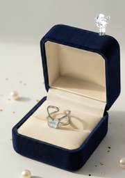 X Butterfly Ring with Blue Stones