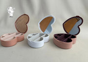 Heart-shaped plastic jewelry organizer with mirror