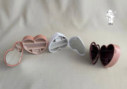 Heart-shaped plastic jewelry organizer with mirror