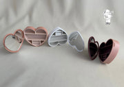 Heart-shaped plastic jewelry organizer with mirror