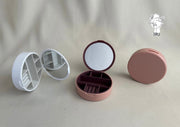 Round plastic jewelry organizer with mirror