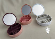 Round plastic jewelry organizer with mirror