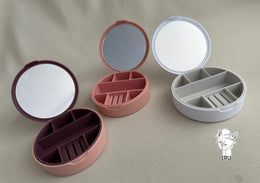 Round plastic jewelry organizer with mirror