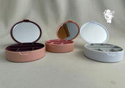 Round plastic jewelry organizer with mirror