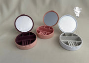 Round plastic jewelry organizer with mirror