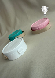 Round plastic jewelry organizer with secure closure and leather handle