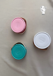 Round plastic jewelry organizer with secure closure and leather handle