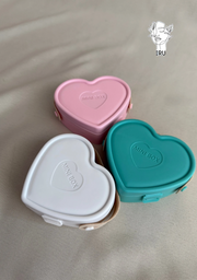Heart-shaped plastic jewelry organizer with secure closure and leather handle