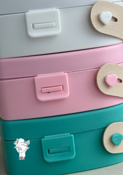 Heart-shaped plastic jewelry organizer with secure closure and leather handle