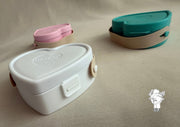 Heart-shaped plastic jewelry organizer with secure closure and leather handle