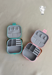 Square plastic jewelry organizer with secure closure and leather handle