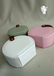 Round leather jewelry organizer with clasp closure and leather handle